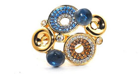 Златен пръстен с циркони, сини топази и опушен кварц
