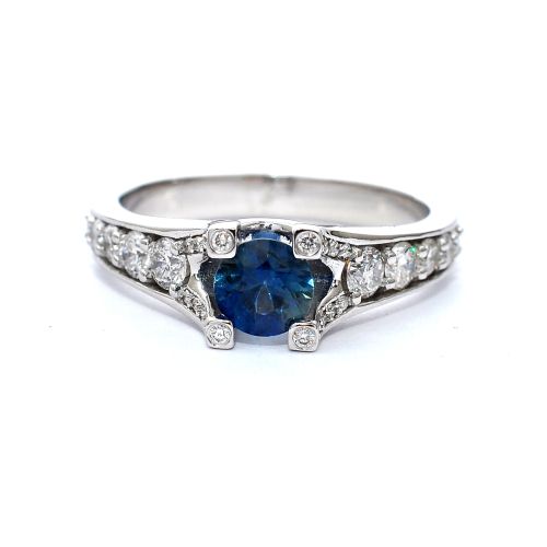 White gold ring with diamonds 0.58 ct and blue topaz 0.57 ct