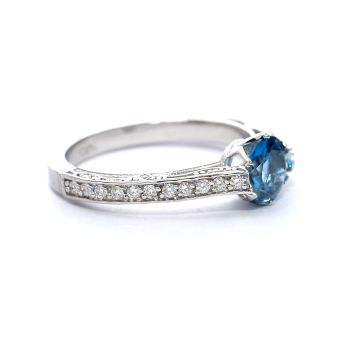 White gold ring with diamonds 0.24 ct and blue topaz 0.87 ct