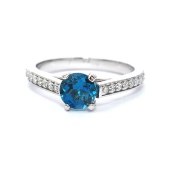 White gold ring with diamonds 0.29 ct and blue topaz 0.97 ct