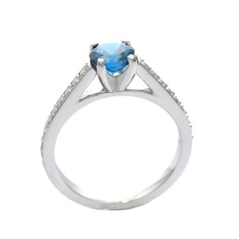White gold ring with diamonds 0.29 ct and blue topaz 0.97 ct