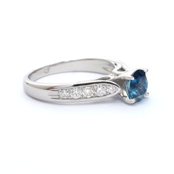 White gold ring with diamonds 0.35 ct and blue topaz 0.96 ct