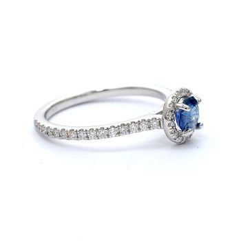 White gold ring with diamonds 0.31 ct and blue topaz 0.64 ct
