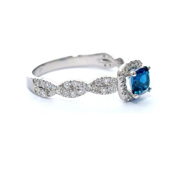 White gold ring with diamonds 0.41 ct and blue topaz 0.74 ct