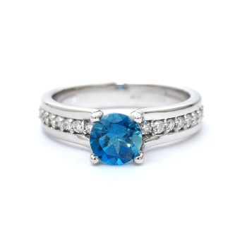 White gold ring with diamonds 0.44 ct and blue topaz 1.06 ct