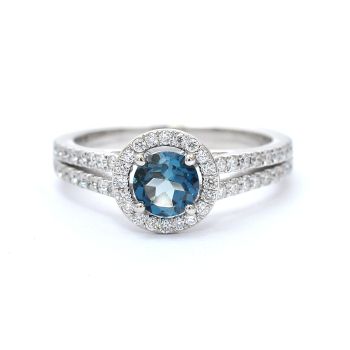 White gold ring with diamonds 0.52 ct and blue topaz 0.62 ct