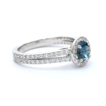 White gold ring with diamonds 0.52 ct and blue topaz 0.62 ct