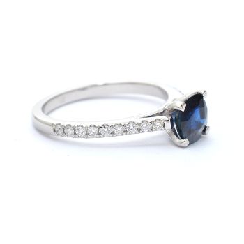 White gold ring with diamonds 0.21 ct and sapphyre 1.25 ct