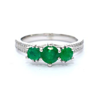 White gold ring with diamond 0.15 ct and emerald 0.94 ct