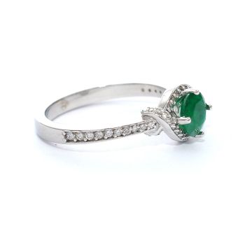 White gold ring with diamond 0.25 ct and emerald 0.60 ct