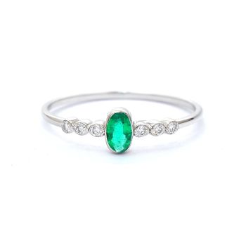 White gold ring with diamond 0.08 ct and emerald 0.11 ct