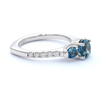 White gold ring with diamonds 0.18 ct and blue topaz 1.56 ct