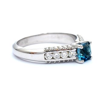 White gold ring with diamonds 0.54 ct and blue topaz 0.73 ct