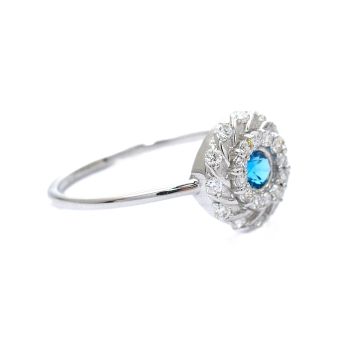 White gold ring with diamonds 0.24 ct and blue topaz 0,13 ct