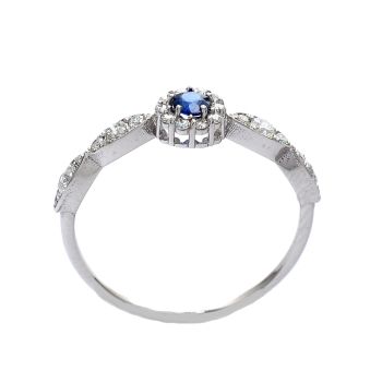 White gold ring with diamonds 0.30 ct and sapphyre 0.11 ct